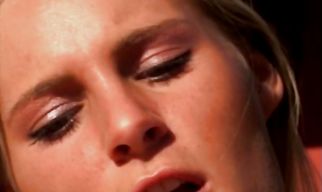 Voluptuous gf sitting down on a royal throne with passion